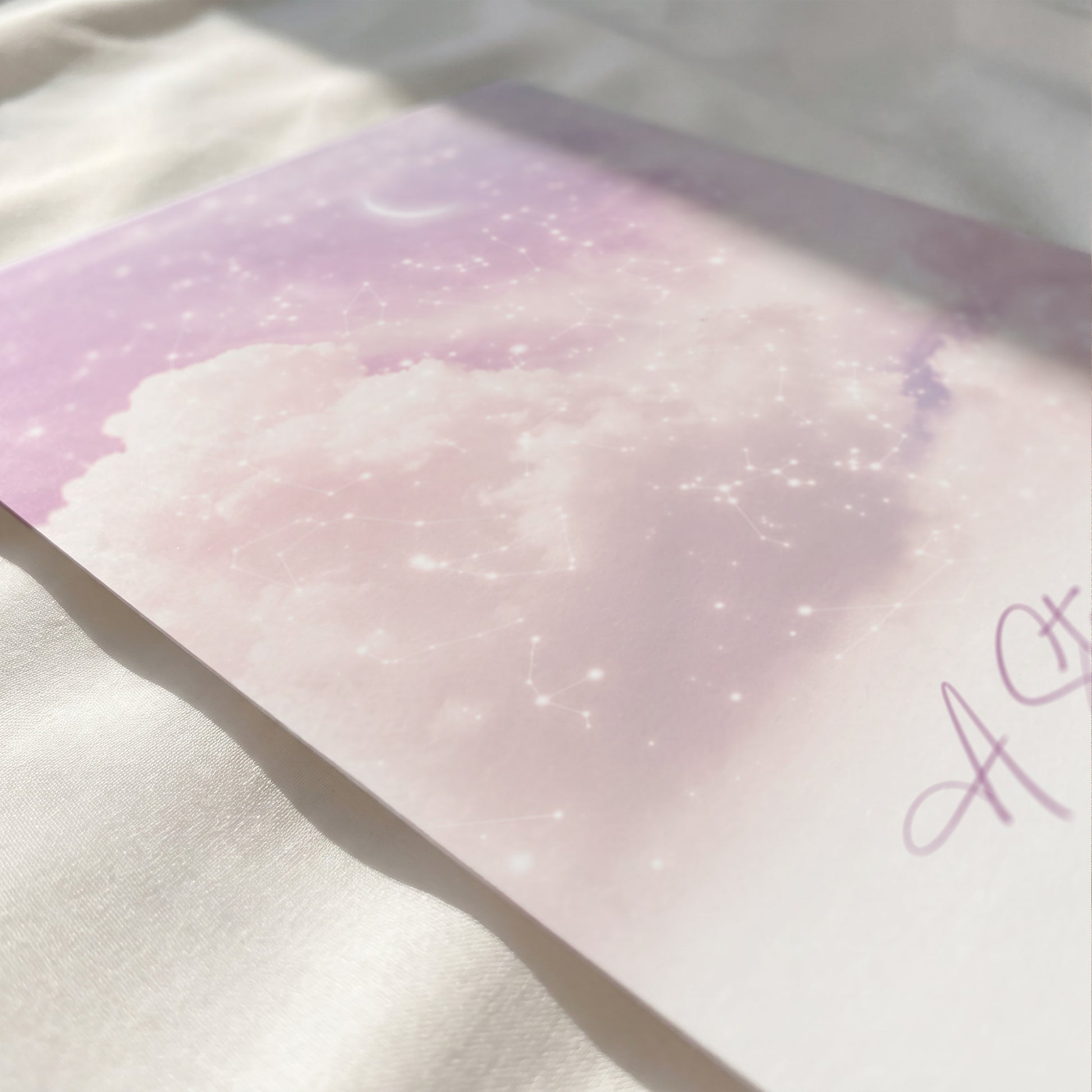 Close-up of a personalized cloudy star map print showing premium paper texture and detailed constellations.