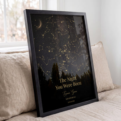 Personalized gold constellation star map displayed in a black frame with custom name and date.