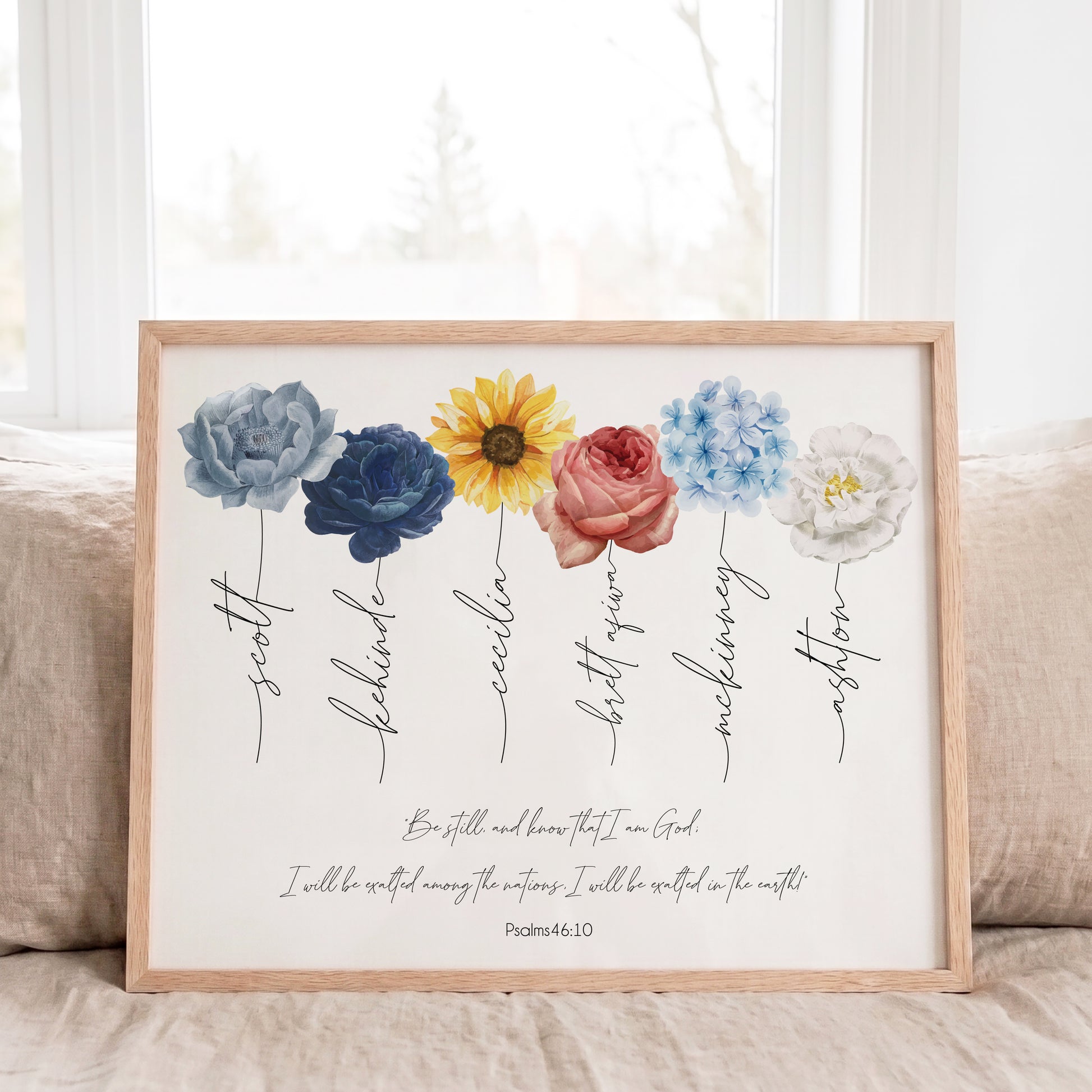 Personalized birth flower bouquet print with custom names in a light oak frame