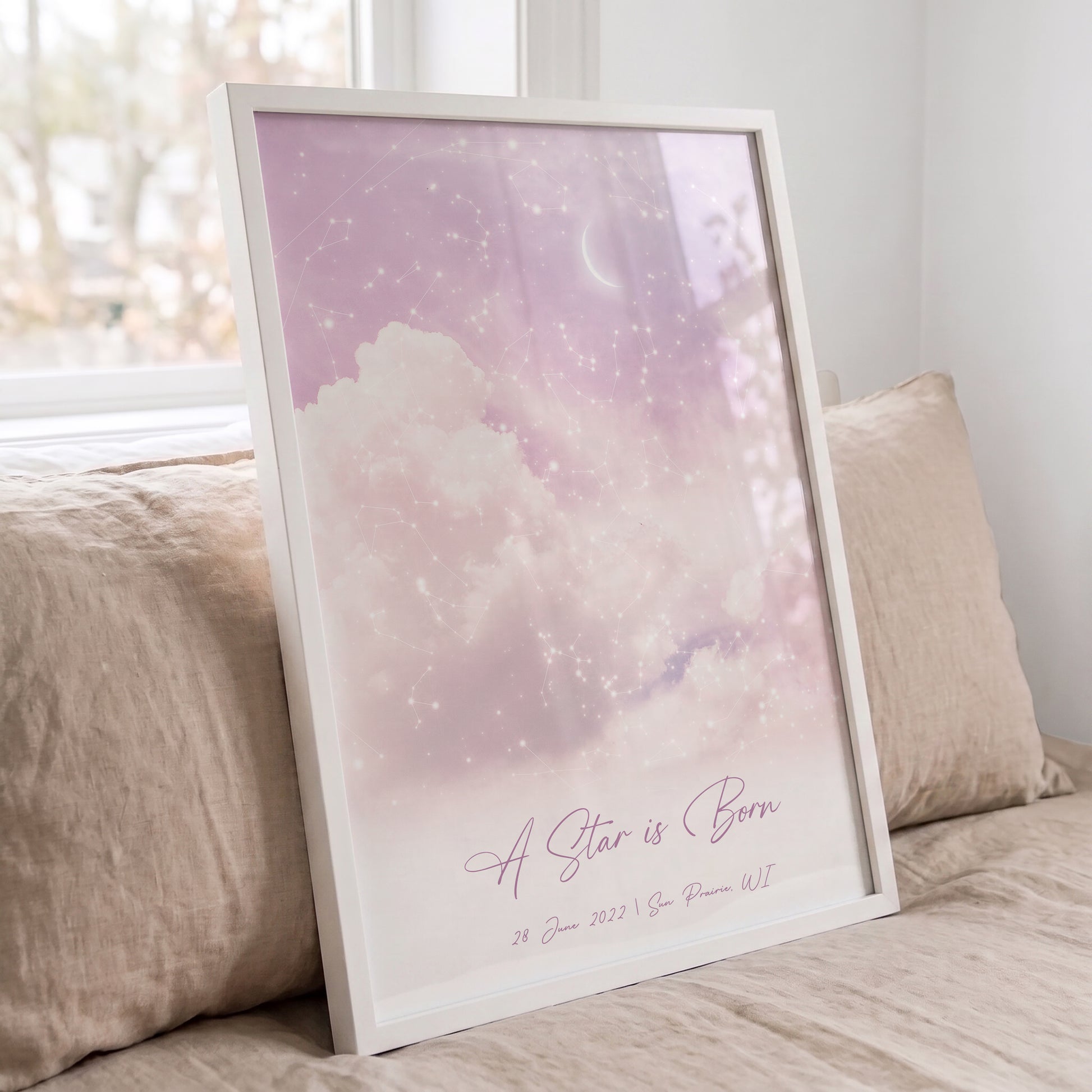 Personalized constellation print in a white frame with a soft pastel cloudy sky design.