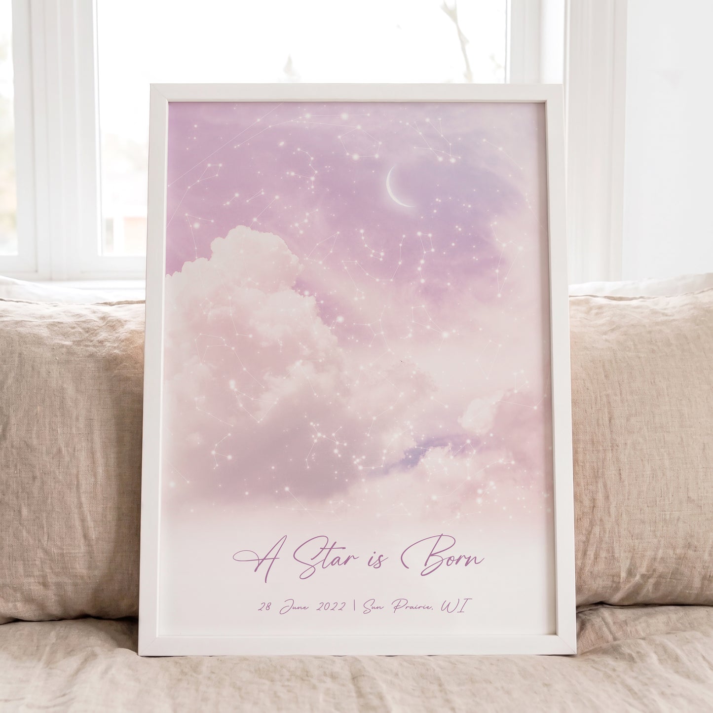 Personalized cloudy star map print in a white frame featuring the real night sky from a special date and location.