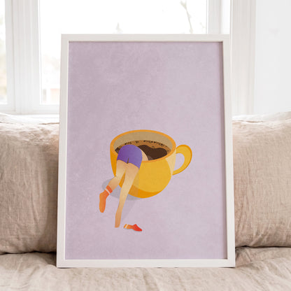 Surreal coffee mug girl art print in white wooden frame hanging on wall