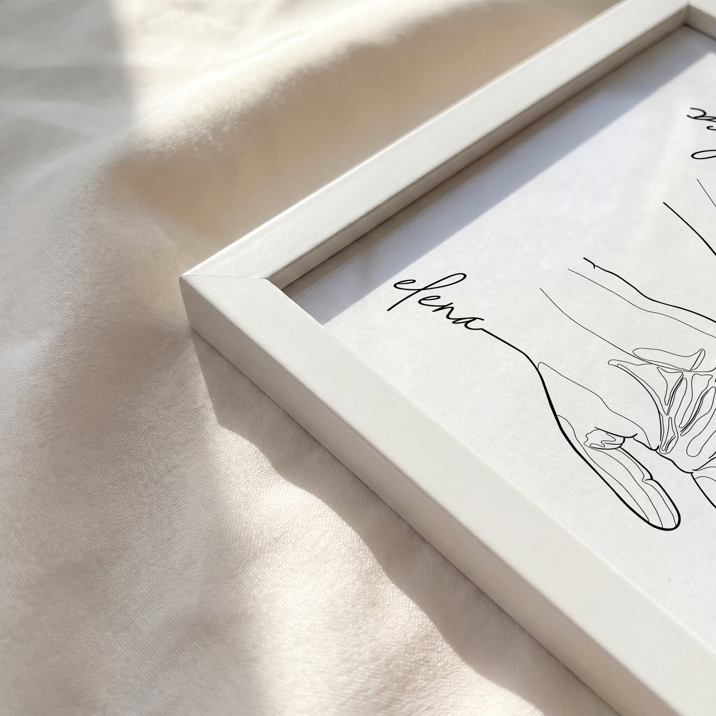 Close-up of the White framed print corner.