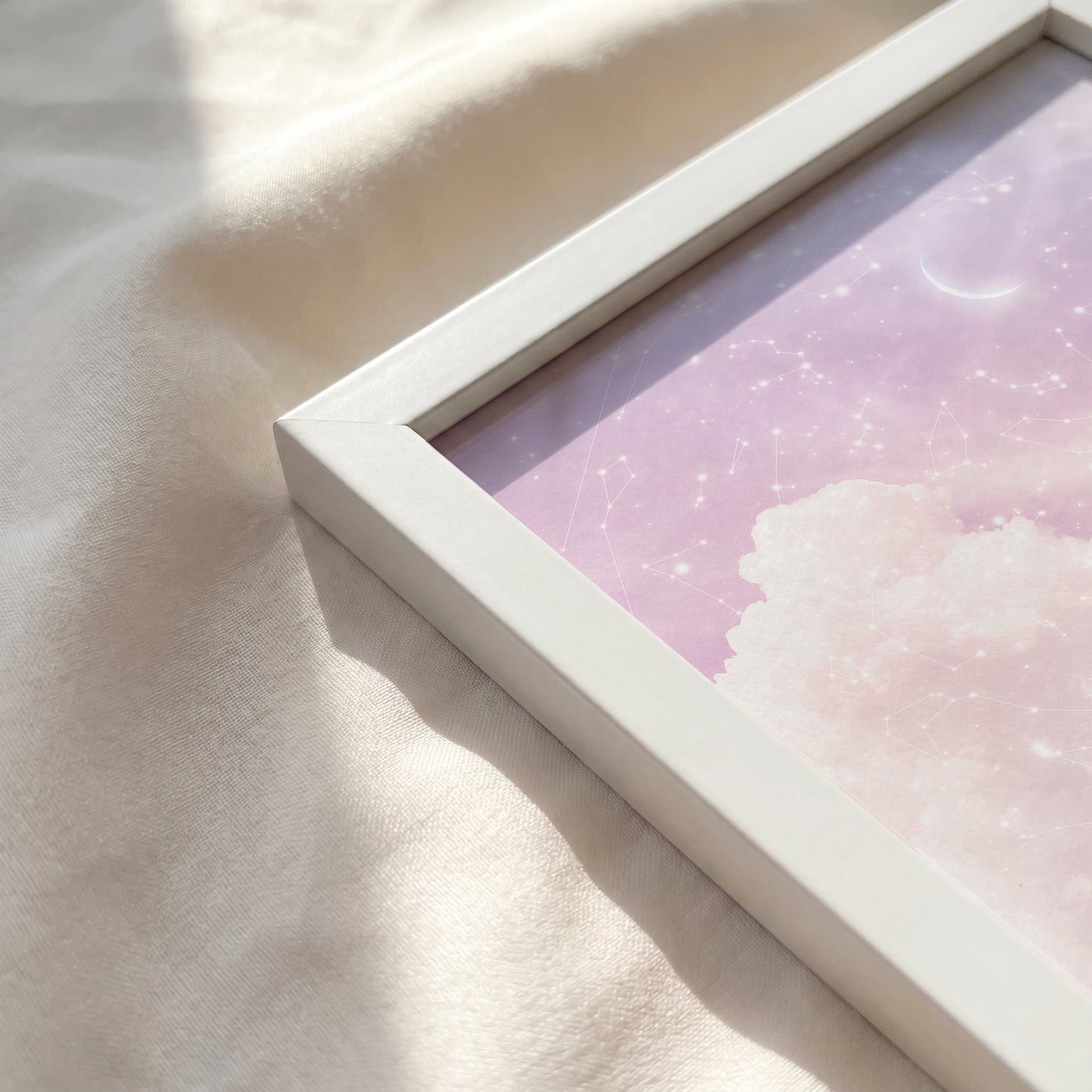 Close-up of the White framed print corner with a smooth matte finish.